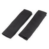 Almohadillas negras para cinturón de seguridad en juego de 2 unidades.