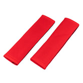 Almohadillas rojas para cinturón de seguridad en juego de 2 unidades.
