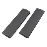 Almohadillas para cinturón de seguridad en color carbono, juego de 2 unidades.